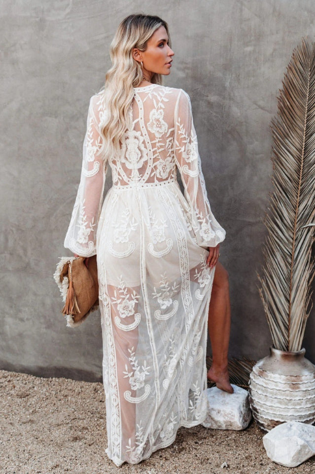 Elegant Lace Maxi Dress with Deep V-Neck and Sheer Long Sleeves