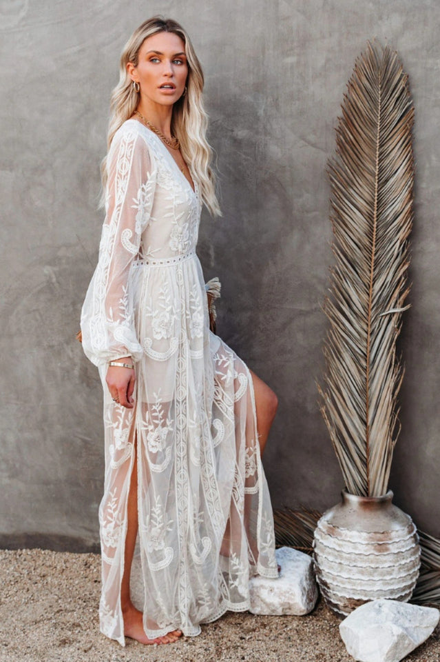 Elegant Lace Maxi Dress with Deep V-Neck and Sheer Long Sleeves