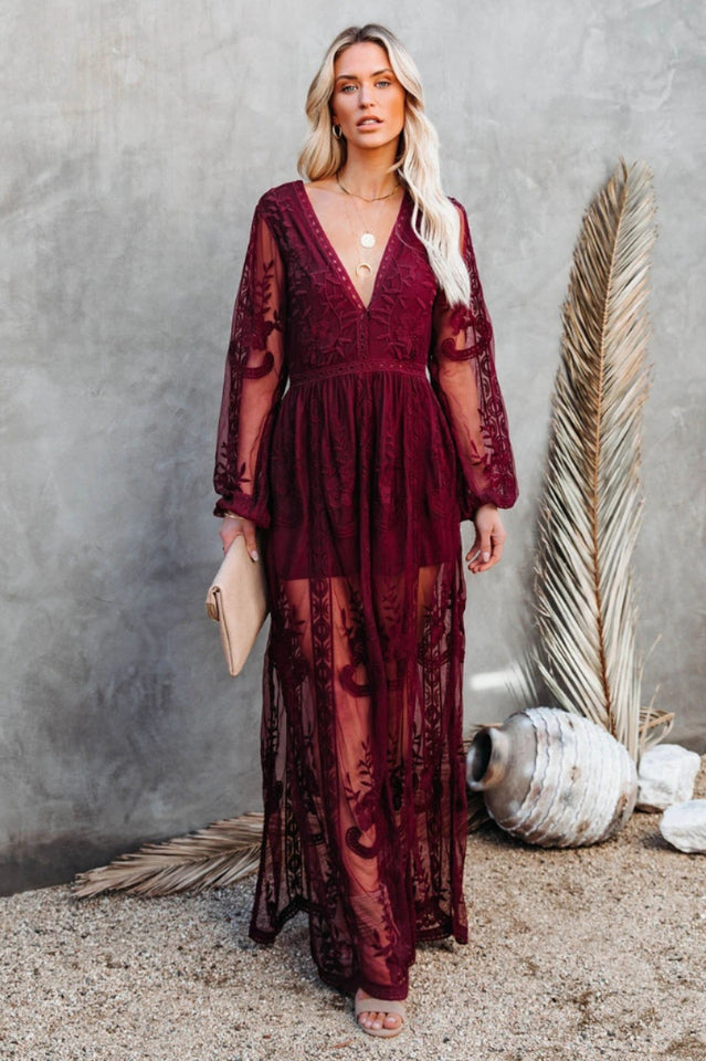 Elegant Lace Maxi Dress with Deep V-Neck and Sheer Long Sleeves