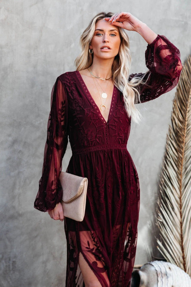 Elegant Lace Maxi Dress with Deep V-Neck and Sheer Long Sleeves
