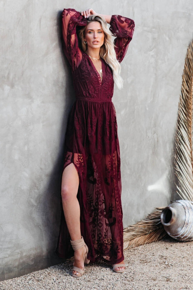 Elegant Lace Maxi Dress with Deep V-Neck and Sheer Long Sleeves